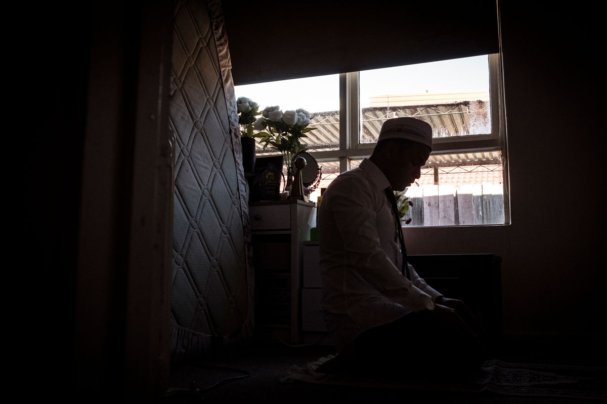Mohamad Yunus during prayer-time at his home in Springvale, Melbourne.