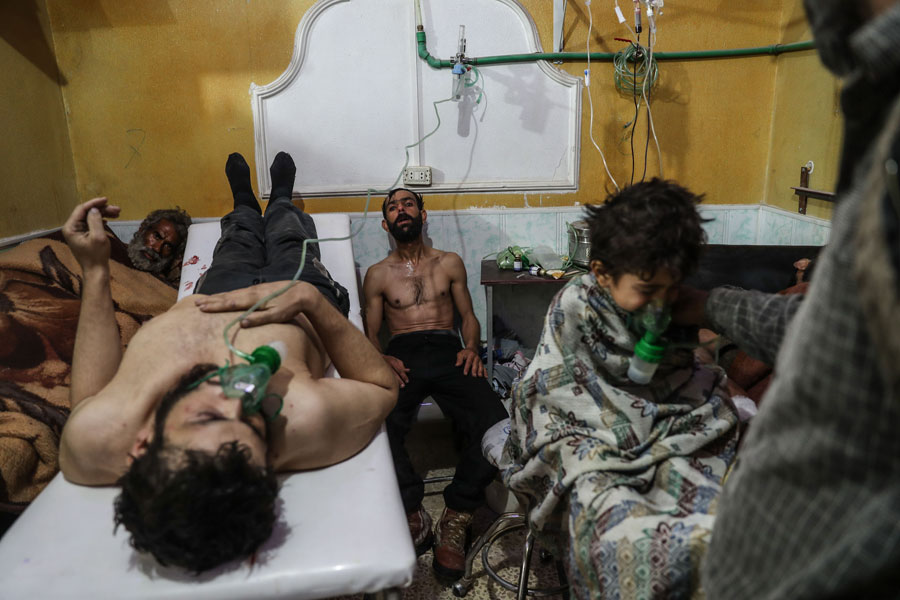 Victims of an Alleged Gas Attack Receive Treatment in Eastern Ghouta by Mohammed Badra, Syria, European Pressphoto Agency.